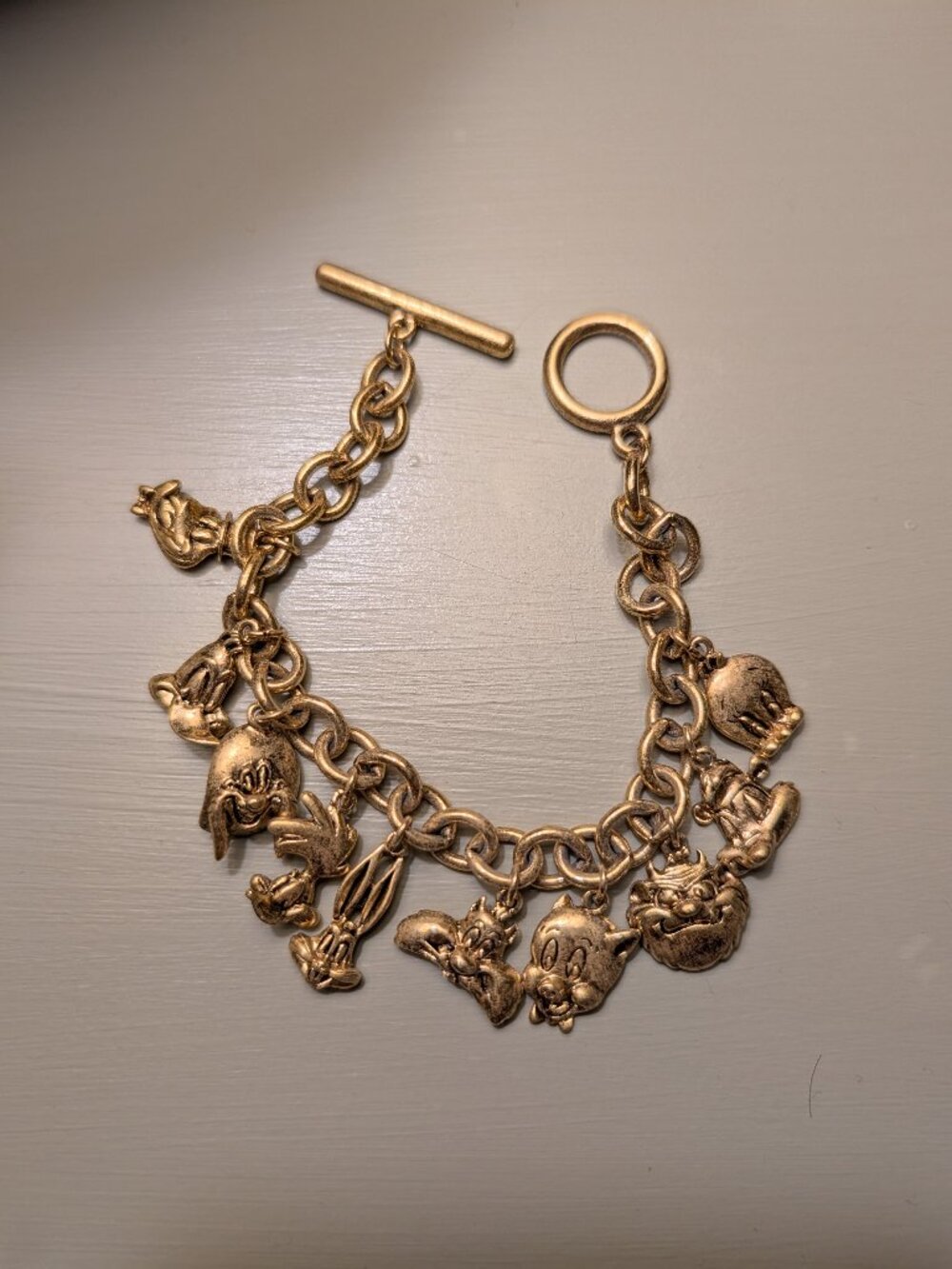 1992 Warner Brothers Looney Tunes gold tone charm bracelet